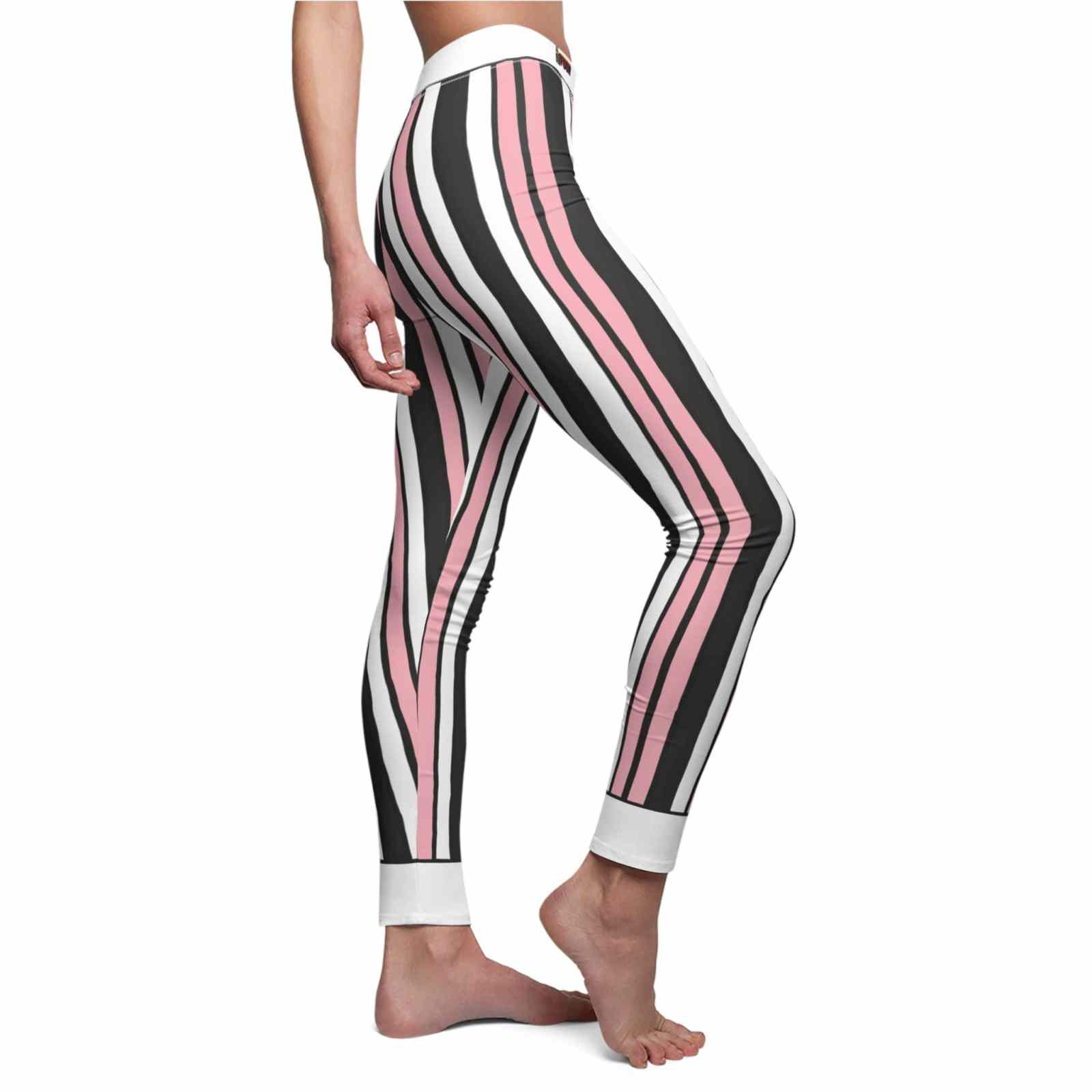 Profile view of Chic Stripe Leggings, perfect for both workouts and casual wear. These sport-luxe leggings are designed for maximum comfort, featuring a high-waist and 4-way stretch material. Enjoy their stylish look while engaging in any activity, as they are durable and squat-proof, making them a great addition to your athleisure wardrobe.