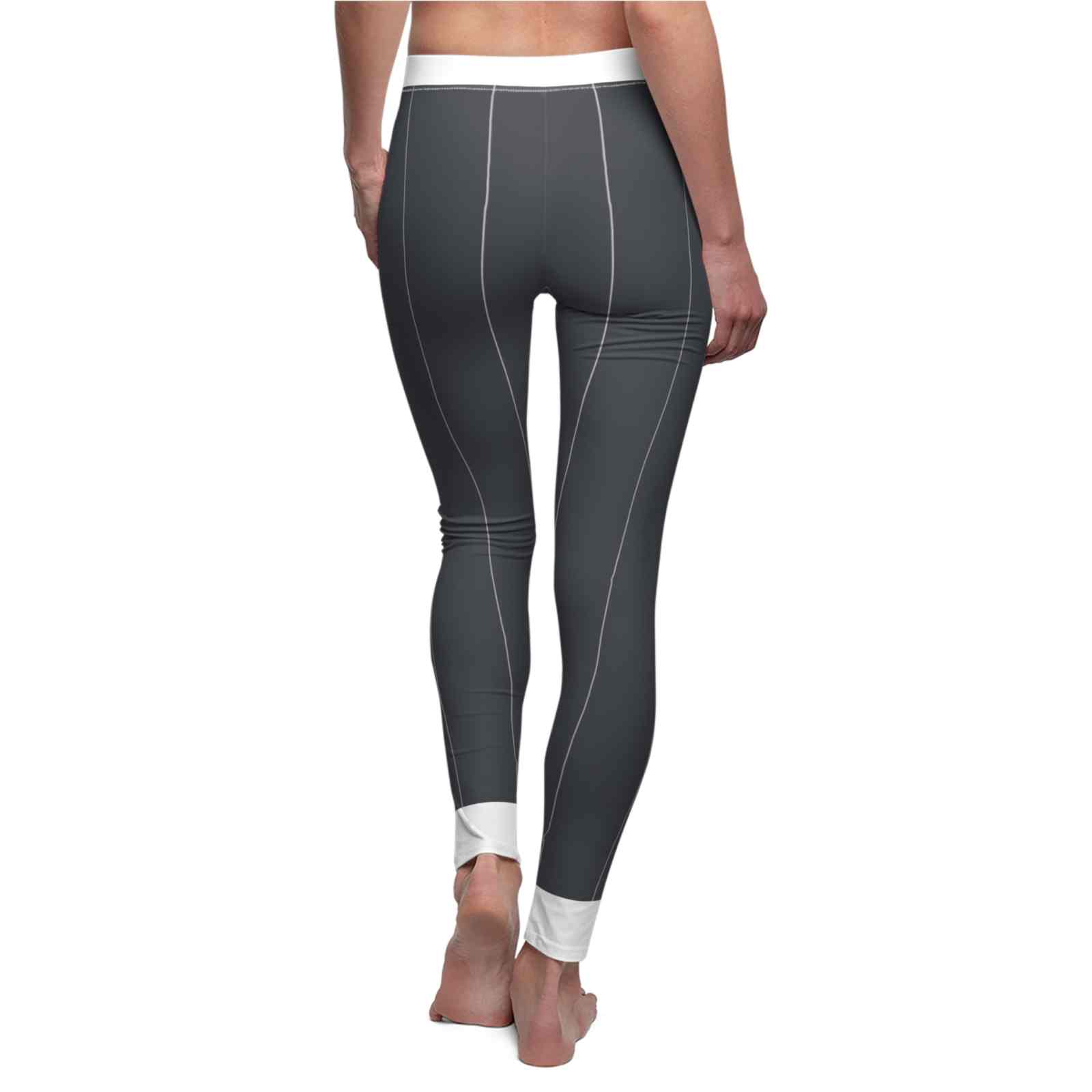 Stylish Women's Casual Leggings from Printify, showcasing a comfortable activewear design perfect for yoga, running, and leisure. The leggings feature a dark color with white contrast stitching for a fashionable look.