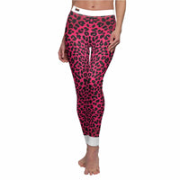Close-up of Women's Pink Leopard Print Leggings designed for sport-luxe style. These statement leggings are high-waist and squat-proof, making them ideal for workouts. With a designer touch, they blend fashion and function as seamless, compression, and 4-way stretch leggings for your athleisure wardrobe.