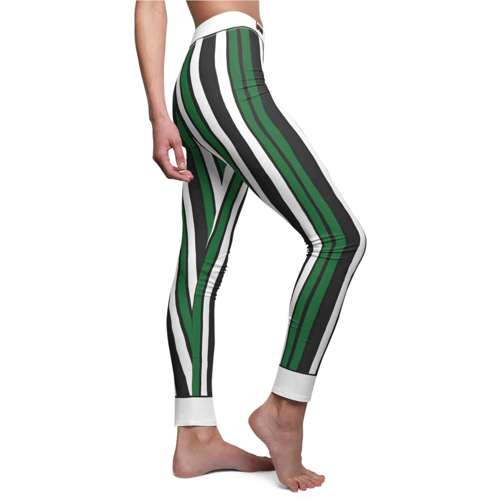 Chic Striped Leggings for Women, featuring a stylish green and black striped design, perfect for casual wear or active lifestyle. These designer leggings offer comfort and style with high-waist and squat-proof features, making them great for yoga, workouts, or loungewear. Ideal choice for those seeking sport-luxe leggings, these seamless and compression leggings provide a flattering fit and are crafted with 4-way stretch, making them perfect gym leggings or athleisure leggings.