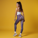Elegant rear view of a model in Purple Leopard Print Casual Leggings, designed to make a statement while providing the comfort of designer leggings and high-waist styles, enhanced with compression and seamless technology.
