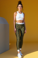 Front view of Stylish Women's Leopard Print Leggings that highlight a trendy high-waist fit. These sport-luxe leggings are not just stylish but also functional, featuring 4-way stretch and compression benefits that make them ideal for any athleisure outfit.