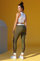 Stylish Women's Leopard Print Leggings featuring a high-waist design, perfect for gym or athleisure. These statement leggings from Printify combine sport-luxe aesthetics with functionality, including 4-way stretch and seamless construction, making them ideal compression leggings for the active woman.