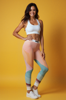 Women's Casual Leggings with Abstract Design – Trendy Yoga Pants, Comfortable Lounge Wear, Fashionable Activewear. Model wearing leggings with a vibrant yellow background.