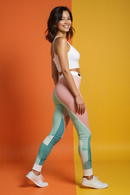 Profile view of a woman in casual leggings featuring a unique abstract design, ideal for fitness and stylish everyday wear.