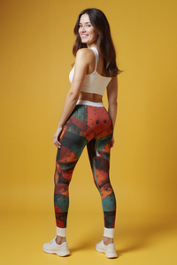 Back view of a woman in Bohemian Printed Leggings, highlighting their vibrant art and unique design, suitable for yoga and casual occasions.