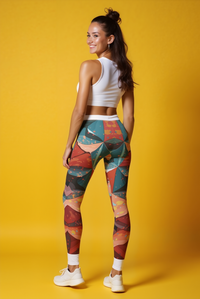 Showcasing the back view of a woman in stylish abstract print leggings for women, perfect for casual wear and fitness. These designer leggings are not only squat-proof but also provide a seamless fit, embodying the sport-luxe aesthetic that makes them the perfect gym leggings.