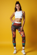 A woman wearing stylish abstract print leggings for women, showcasing a vibrant design perfect for casual wear, yoga, and fitness. These high-waist leggings are also known as statement leggings, featuring a 4-way stretch for maximum comfort and flexibility, making them ideal athleisure leggings.