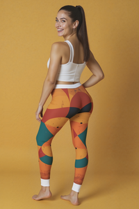 Back view of a model in stylish women's casual leggings, AOP print activewear, showcasing the colorful design and fit. These athleisure leggings are not only fashionable but offer functionality with their high-waist, seamless design and compression fit, making them perfect for workouts or casual wear.