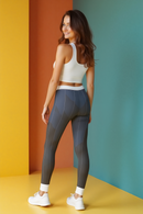 Close-up view of Designer Women's High Waist Yoga Leggings in leopard print, showcasing the premium sustainable material.