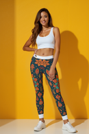 Front view of a model wearing Bohemian Floral Leggings paired with a white crop top, highlighting casual leggings ideal for yoga and fitness.