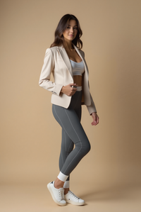 Fashionable women's casual leggings by Printify, paired with a stylish beige blazer, showcasing versatility for both workouts and everyday wear.