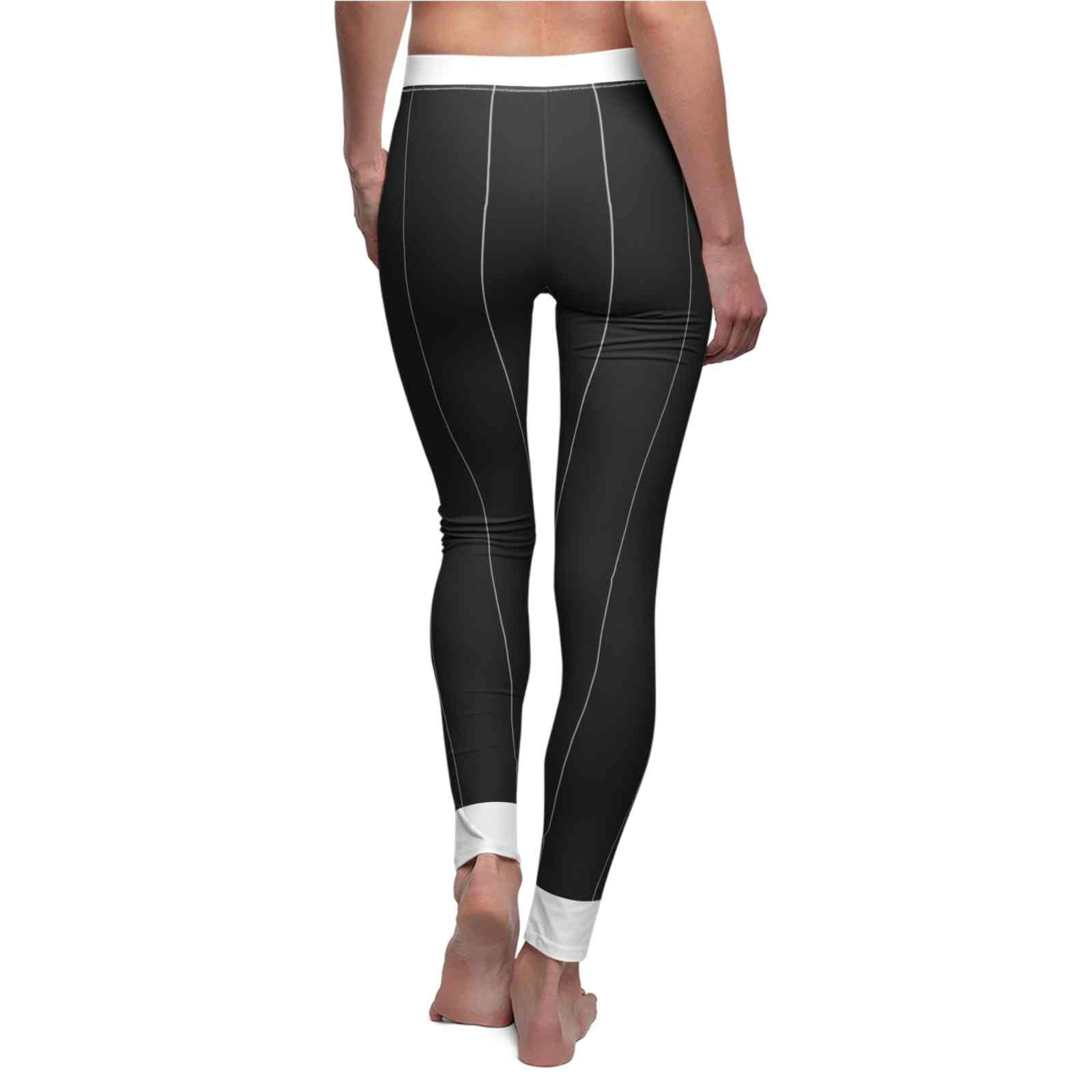 Woman showing the back of Women's Cut & Sew Casual Leggings (AOP) by Printify, displaying a chic design with white stitched accents, perfect for yoga or casual wear.