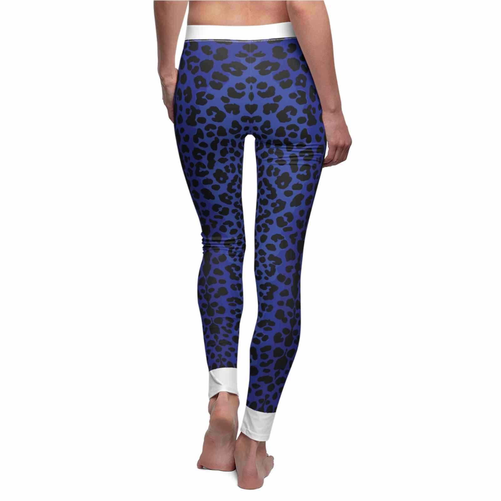 A model showcasing Women's Blue Leopard Print Leggings, emphasizing their stylish design and casual activewear appeal. These statement leggings feature a high-waist style, designed for ultimate comfort during workouts or lounging. Ideal for fitness enthusiasts, these sport-luxe leggings offer a squat-proof fit and 4-way stretch for superior flexibility. Perfect as compression and seamless leggings, they excel as gym and athleisure wear.