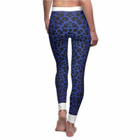 A model showcasing Women's Blue Leopard Print Leggings, emphasizing their stylish design and casual activewear appeal. These statement leggings feature a high-waist style, designed for ultimate comfort during workouts or lounging. Ideal for fitness enthusiasts, these sport-luxe leggings offer a squat-proof fit and 4-way stretch for superior flexibility. Perfect as compression and seamless leggings, they excel as gym and athleisure wear.
