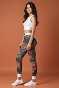 Side view of a model in casual leggings with a colorful mandala pattern, emphasizing stylish yoga pants for fitness enthusiasts.