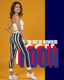 Casual Striped Leggings showcased on a model against a vibrant yellow background, representing stylish activewear for women, perfect for yoga and fitness.